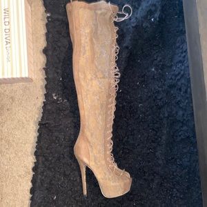 Thigh high lace boots. Worn once.